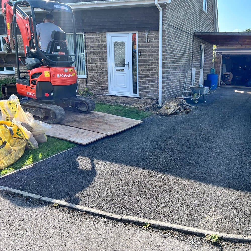 Porch and driveway by WCS Building Services in East Devon